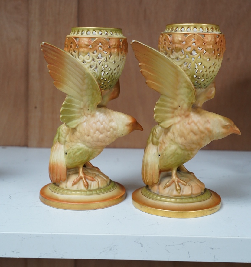 A pair of Royal Worcester blush ivory pot pourri, lacking covers, model number G11, height 9cm. Condition - good